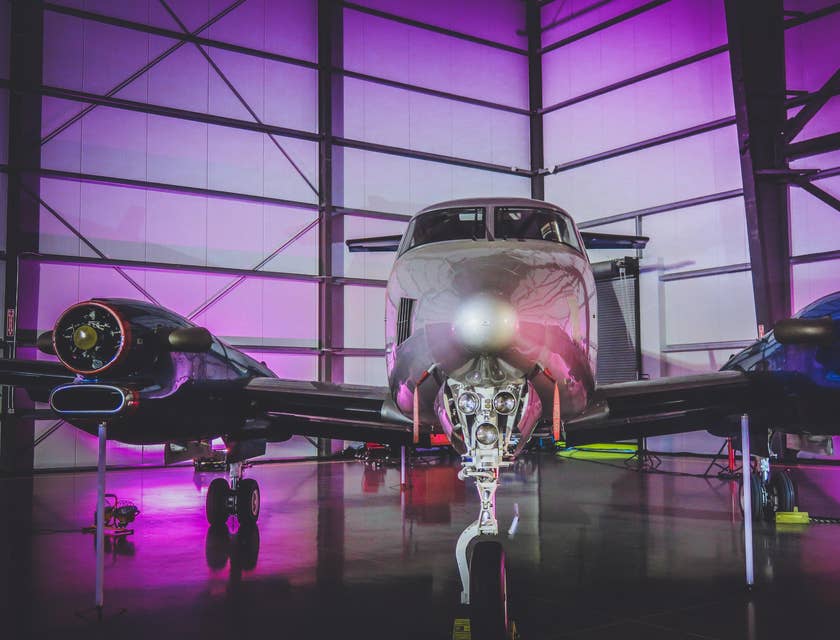 elite private jet parked in a hangar