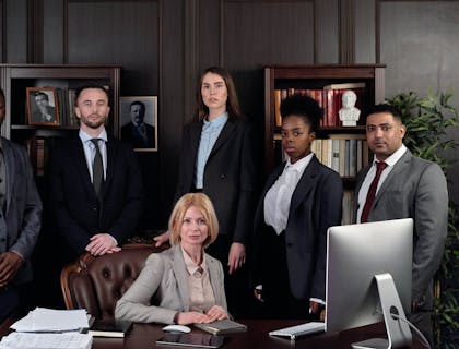 A group of lawyers inside an estate planning law office.