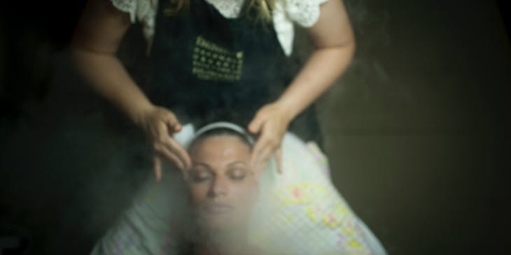 woman receiving a facial