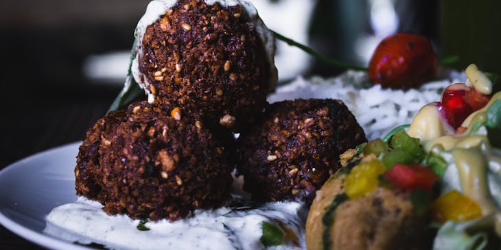 Plated falafel served at a restaurant.