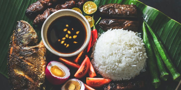 Filipino meal on banana leaves.