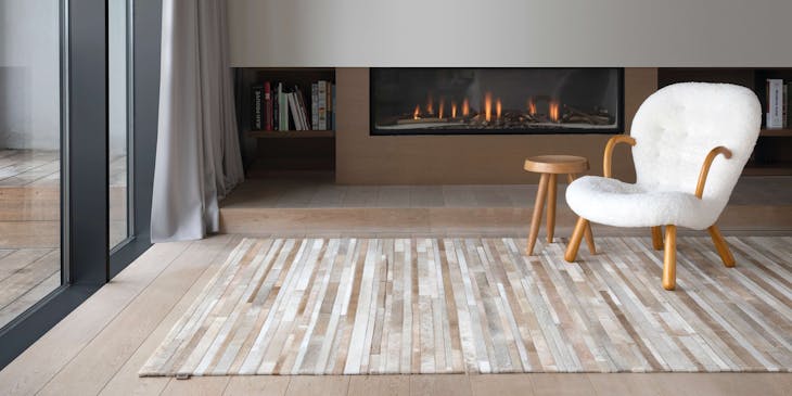 A fireplace installed by fireplace service on a contemporary house.