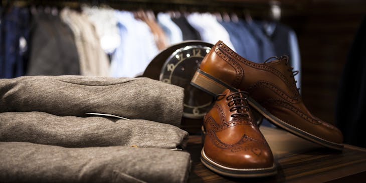 Formal clothes on a table.