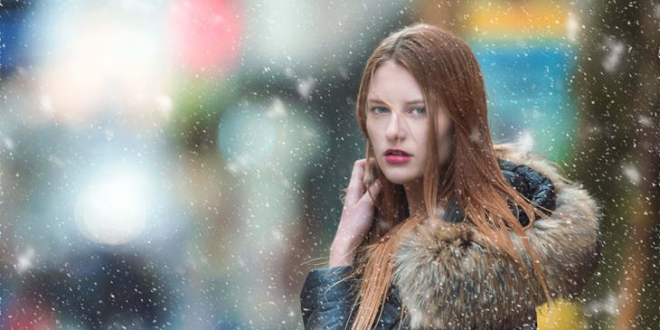 A female model wearing fur clothing.