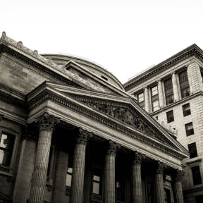 Get a small business loan from the bank.