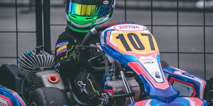 A child in go-kart number 107 before the race.