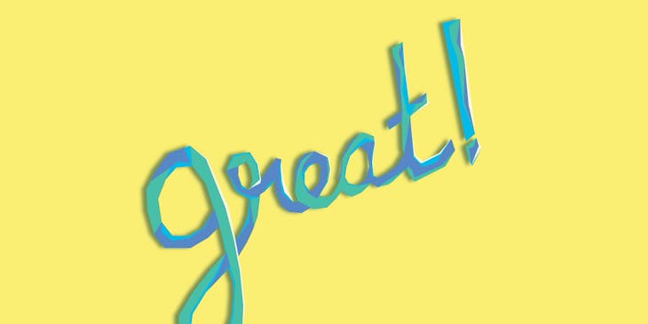 The word "great!" spelled out on a pale yellow surface.