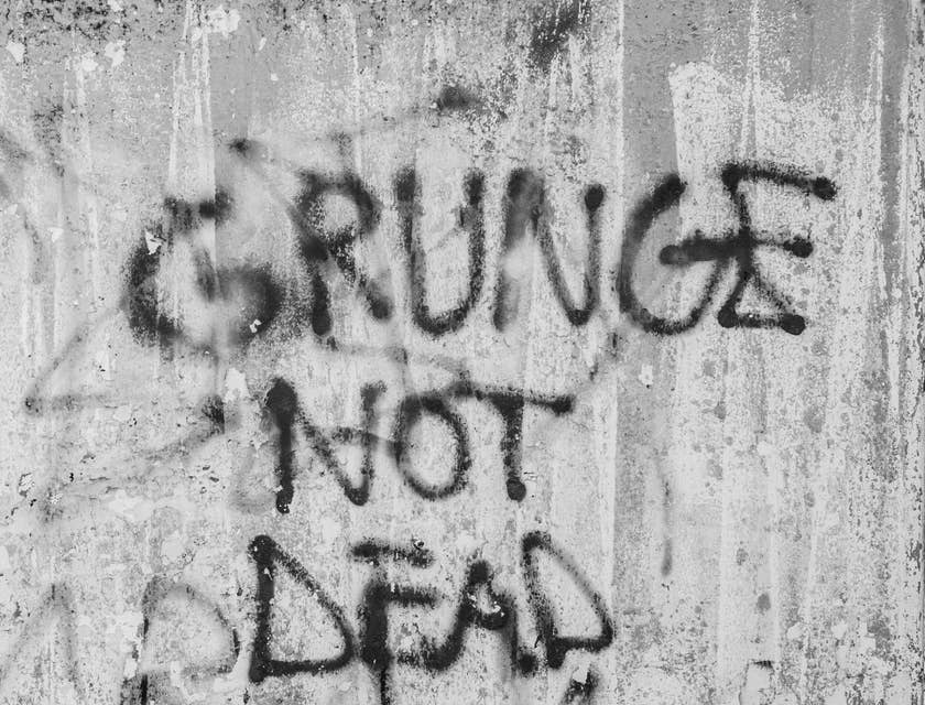 A grungy message scrawled on a wall.