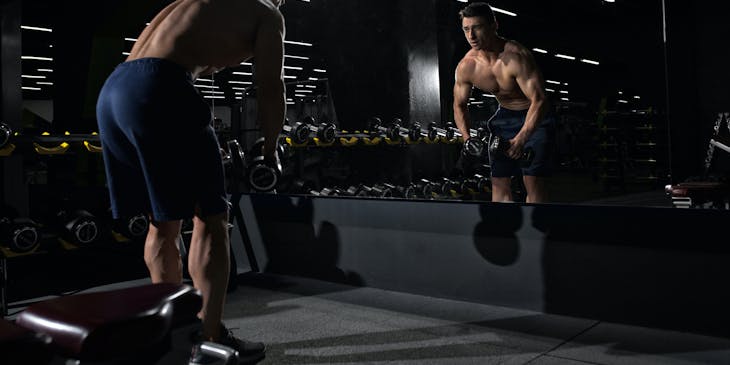 A man working out in gym business.