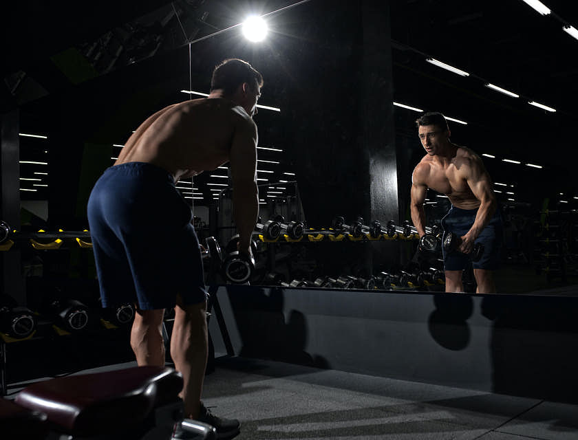 A man working out in gym business.