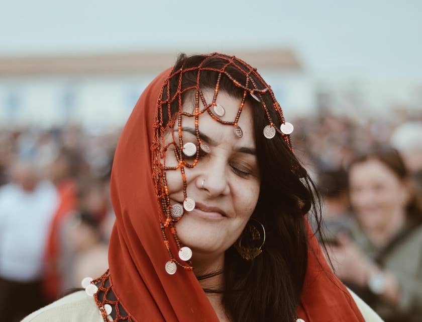 A gypsy woman dancing at an event wearing clothing from a gypsy business.