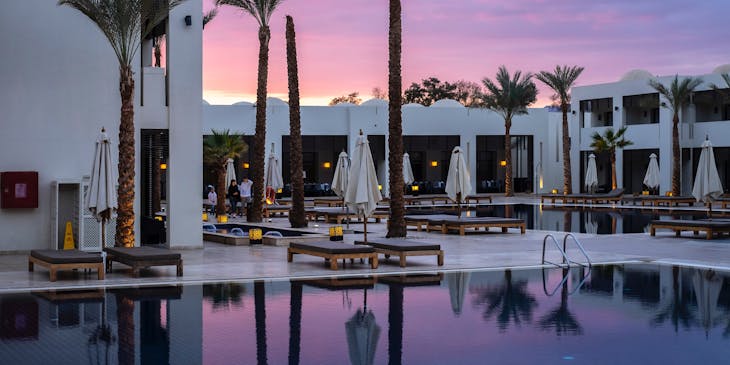 view of a hospitality business at sunset