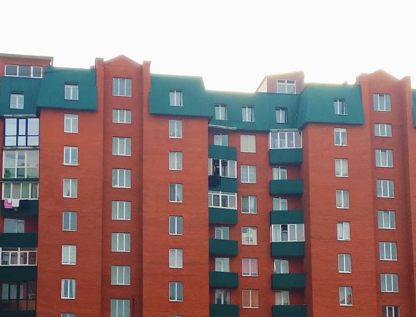 Red and green apartment building.