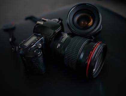 Canon camera and lens on a black background