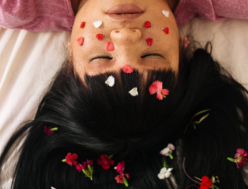 Woman in dreamlike state under hypnosis or hypnotherapy.