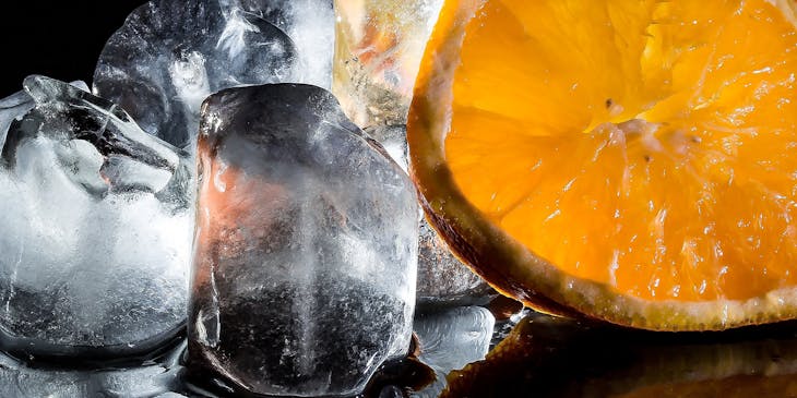Ice cubes and a slice of orange.