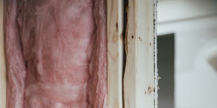 Insulation installed inside a wall.