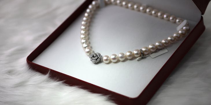 A necklace on display at jewelry business.