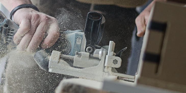Joinery equipment used on wooden parts being prepared for assembly
