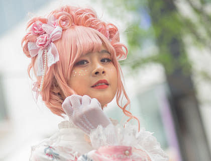 A woman dressed in the Lolita fashion that is part of the kawaii culture.