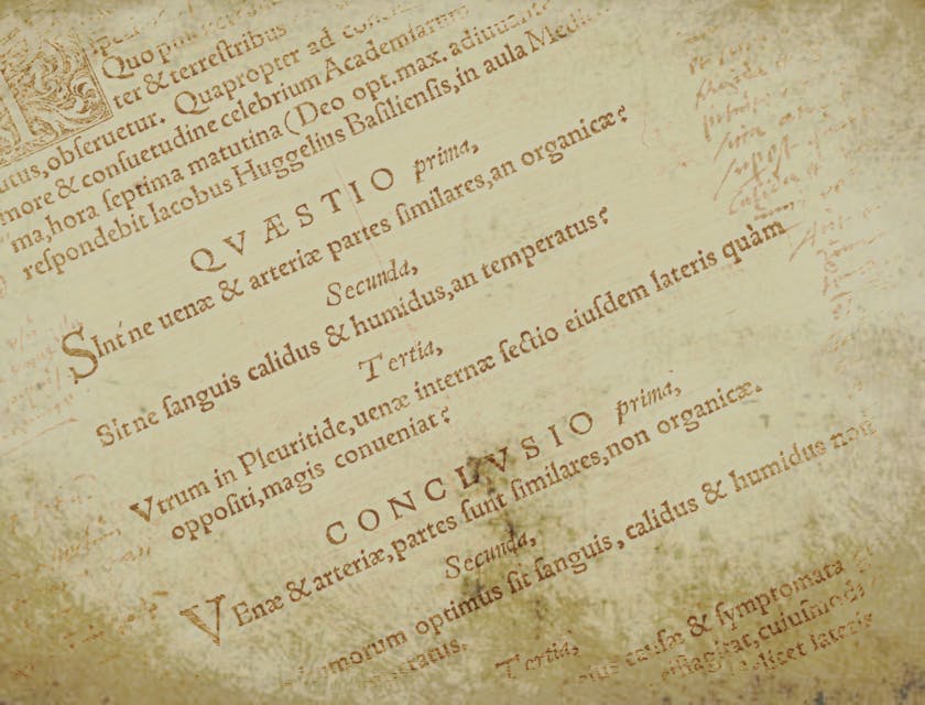 Page from an old book with Latin writing on it.