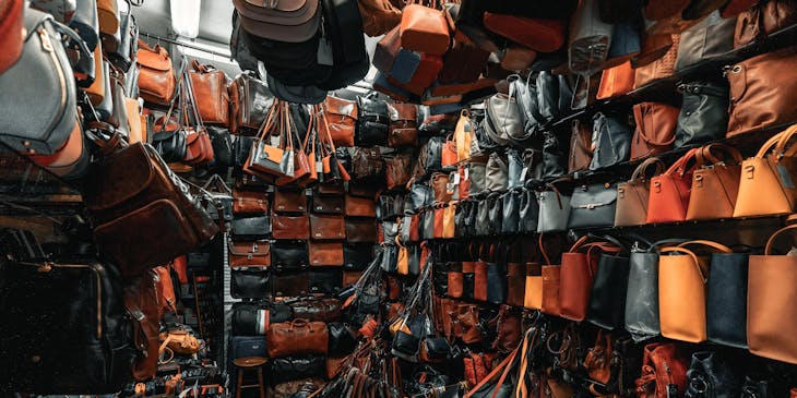 Leather products set out in a store.