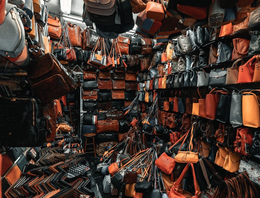 Leather products set out in a store.