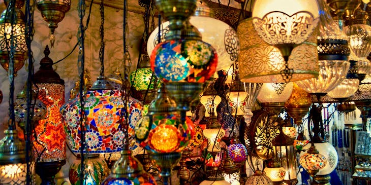 Dozens of lights and lamps hanging in a lighting store