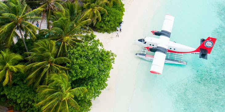 plane parked on a luxurious business island in the Maldives