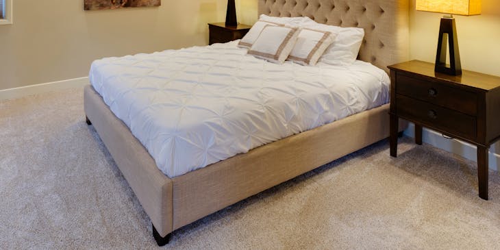 A mattress on a bed.