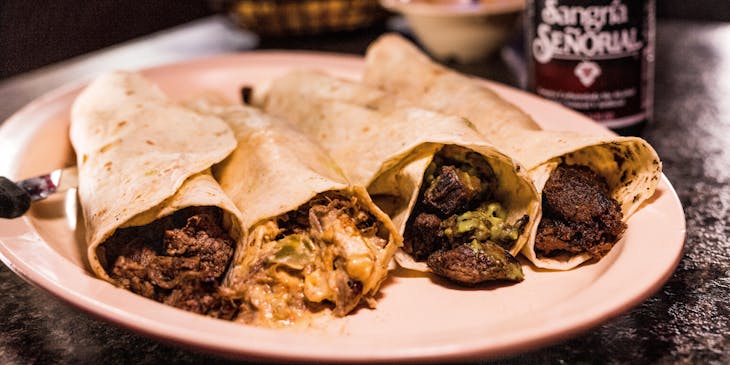 Food and drink at a Mexican bar.