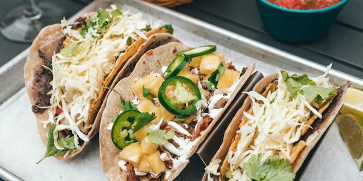 A tray of tacos at a Mexican restaurant.