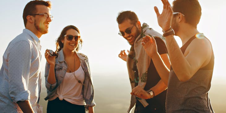 A group of millennial people laughing and having fun.