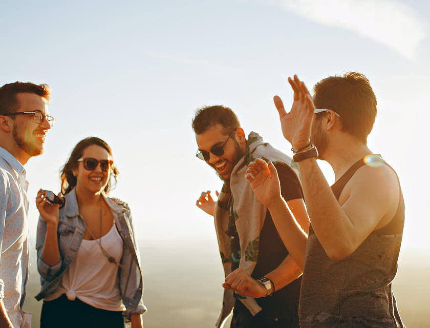 A group of millennial people laughing and having fun.