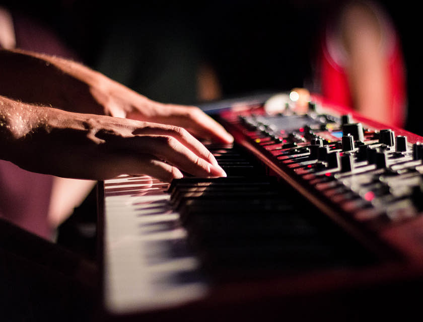 A man playing an electronic keyboard.