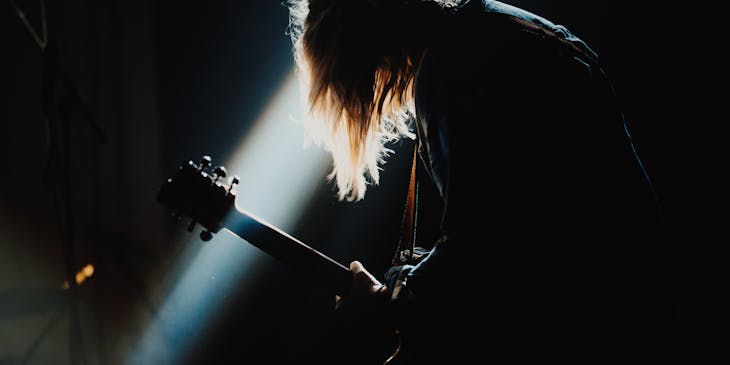 A musician playing guitar.