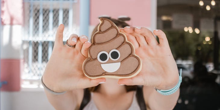 Lady has pet waste removal business showing poop.
