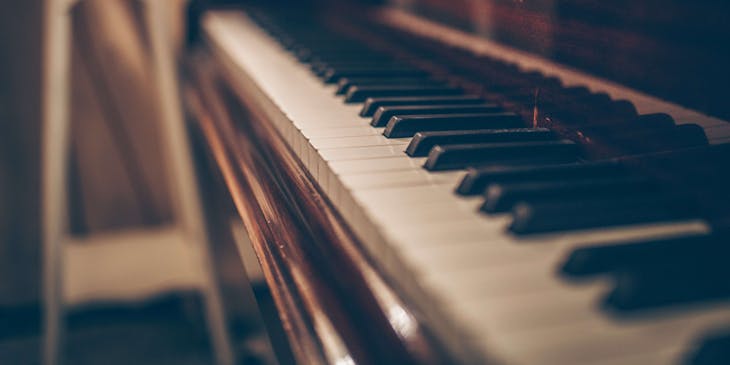 Zoomed in shot of piano keys in a piano store.