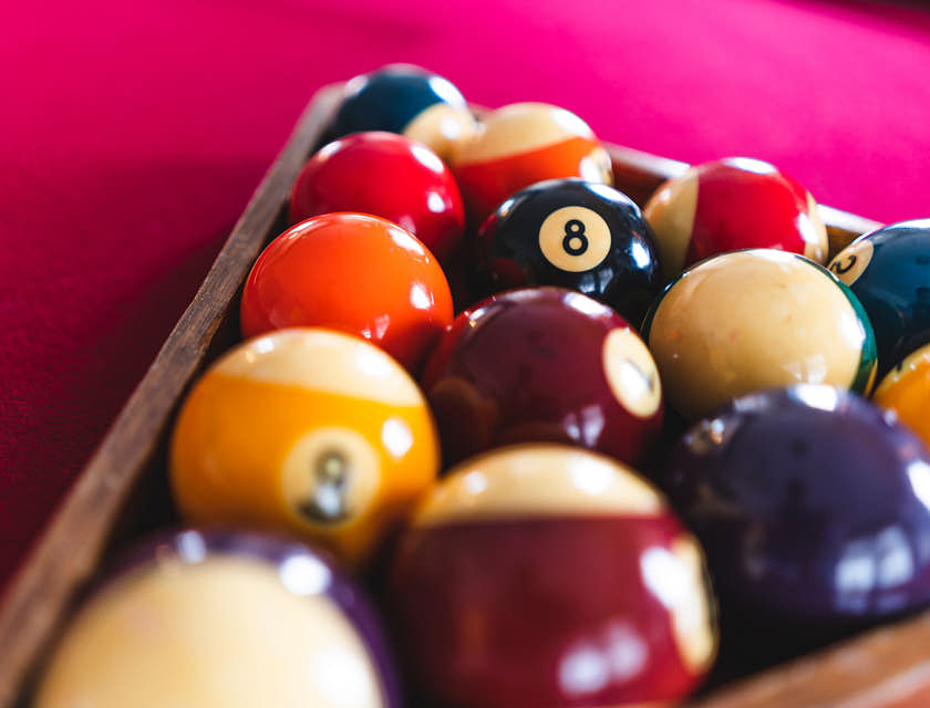 Pool balls on a pool table.