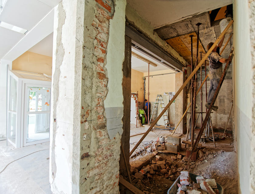 A team of workers remodeling a building.