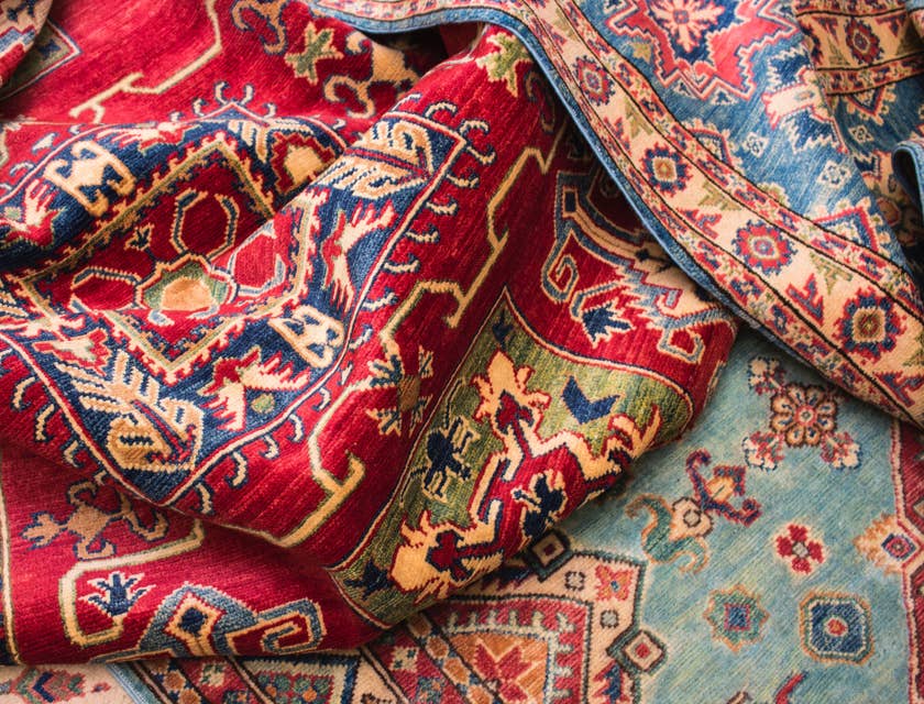 Several rugs piled on the floor.