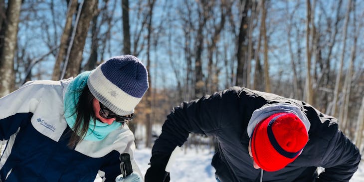 A skier receiving instruction.