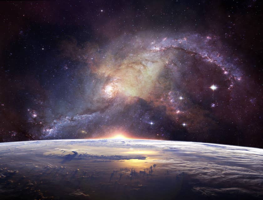 Immagine dello spazio aperto in cui emerge la superficie di un pianeta e una galassia.