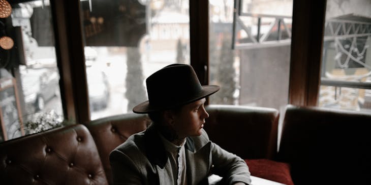 A stylish speakeasy patron.