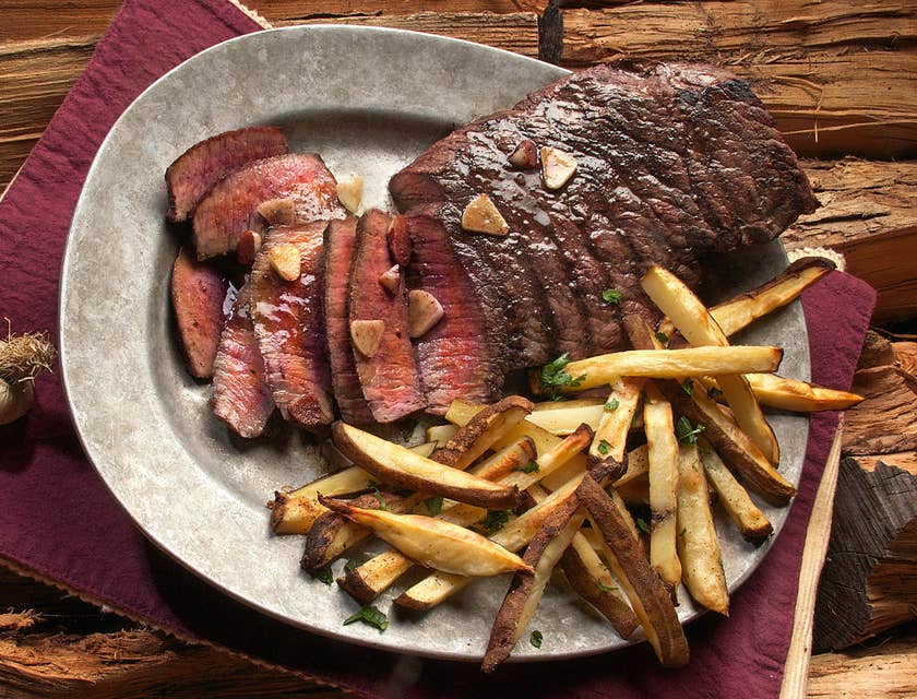 Steak and fries served at a steakhouse.