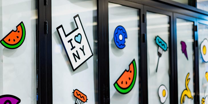 A variety of stickers on glass windows.