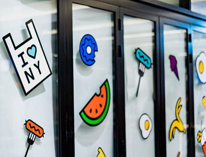 A variety of stickers on glass windows.