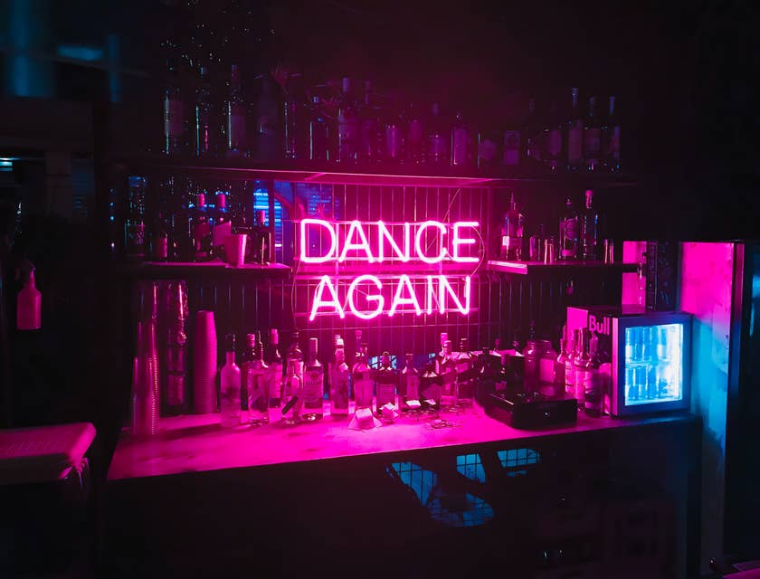 A neon sign in a strip club.