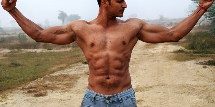A strong man showing his muscles.