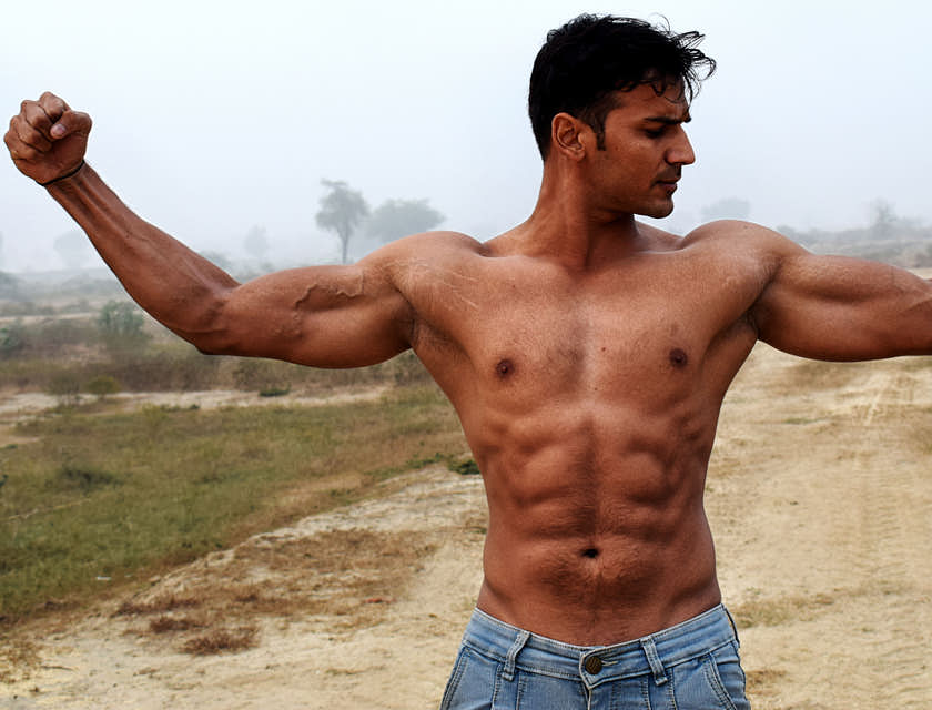 A strong man showing his muscles.